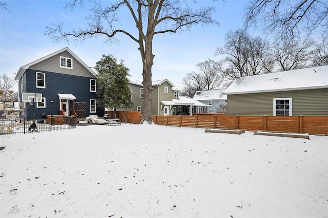 view of yard layered in snow