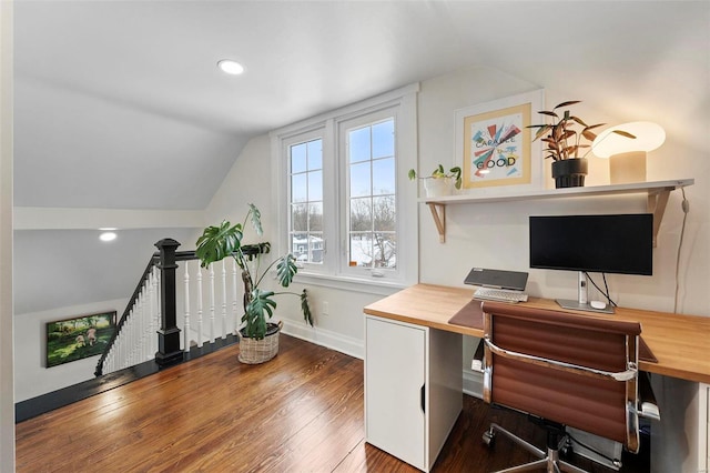 office area with vaulted ceiling and dark hardwood / wood-style floors