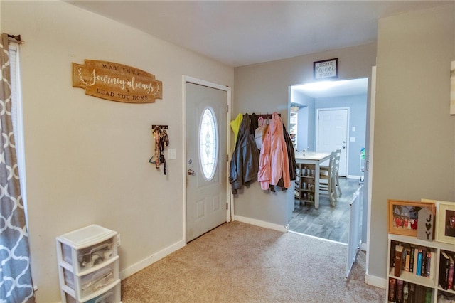 entryway featuring carpet floors