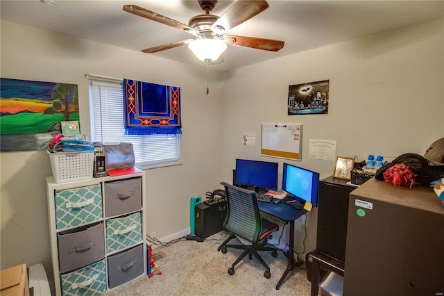 carpeted home office with ceiling fan