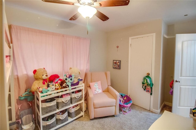 carpeted bedroom featuring ceiling fan