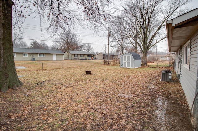 view of yard with a storage shed