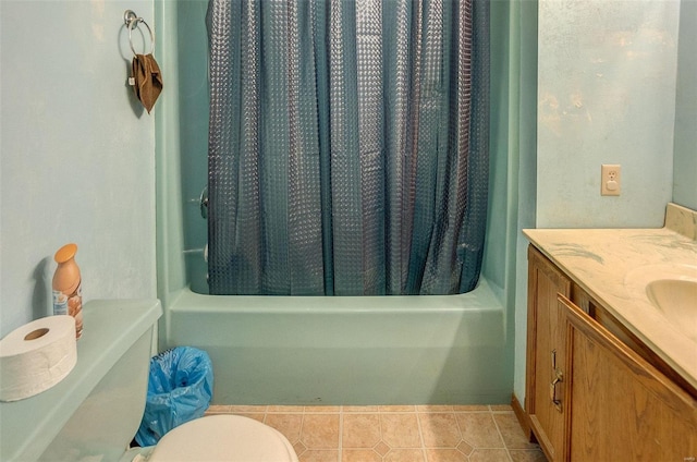 bathroom with tile patterned flooring, vanity, curtained shower, and toilet