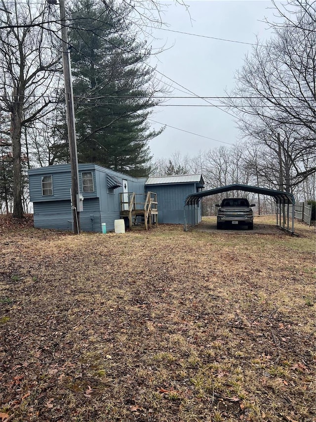 view of yard with a carport