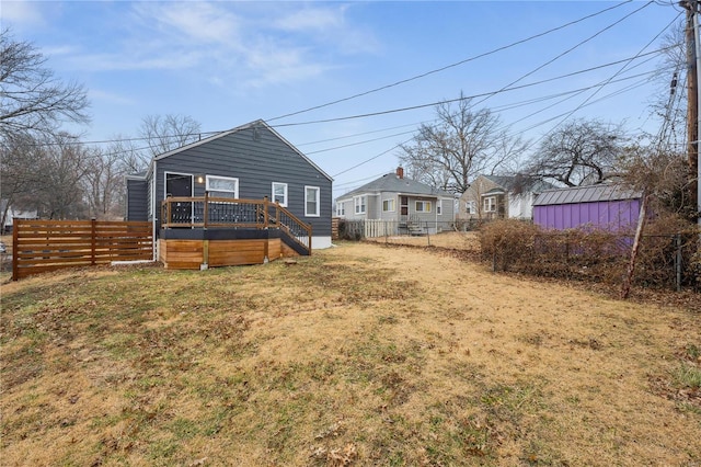 view of yard with a wooden deck