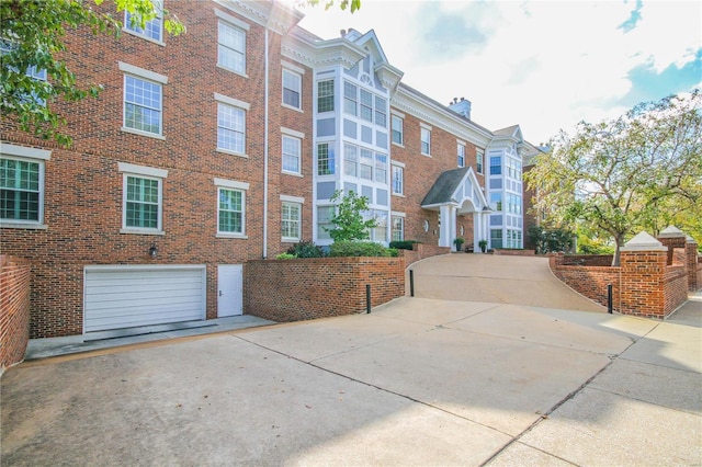 view of building exterior with a garage