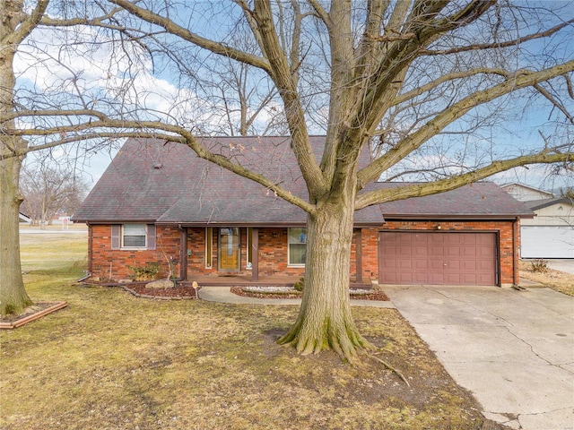 ranch-style home with a garage and a front yard