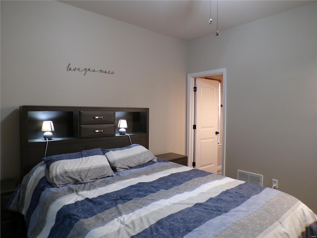 bedroom with visible vents