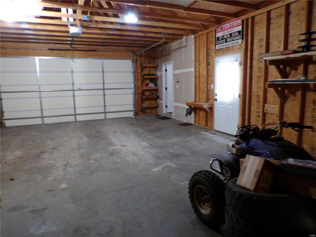 garage featuring a garage door opener