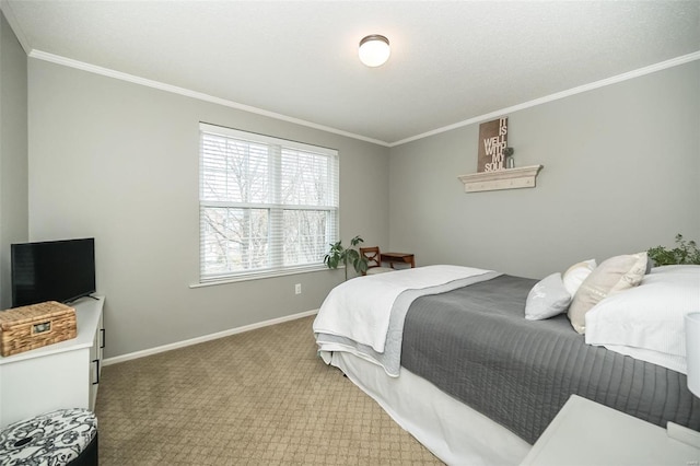 carpeted bedroom featuring crown molding