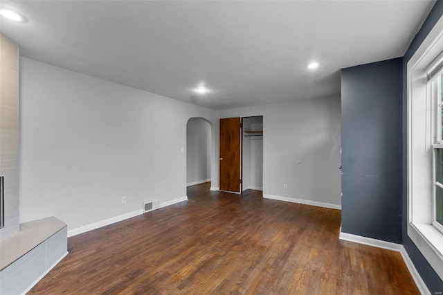 interior space with dark hardwood / wood-style floors