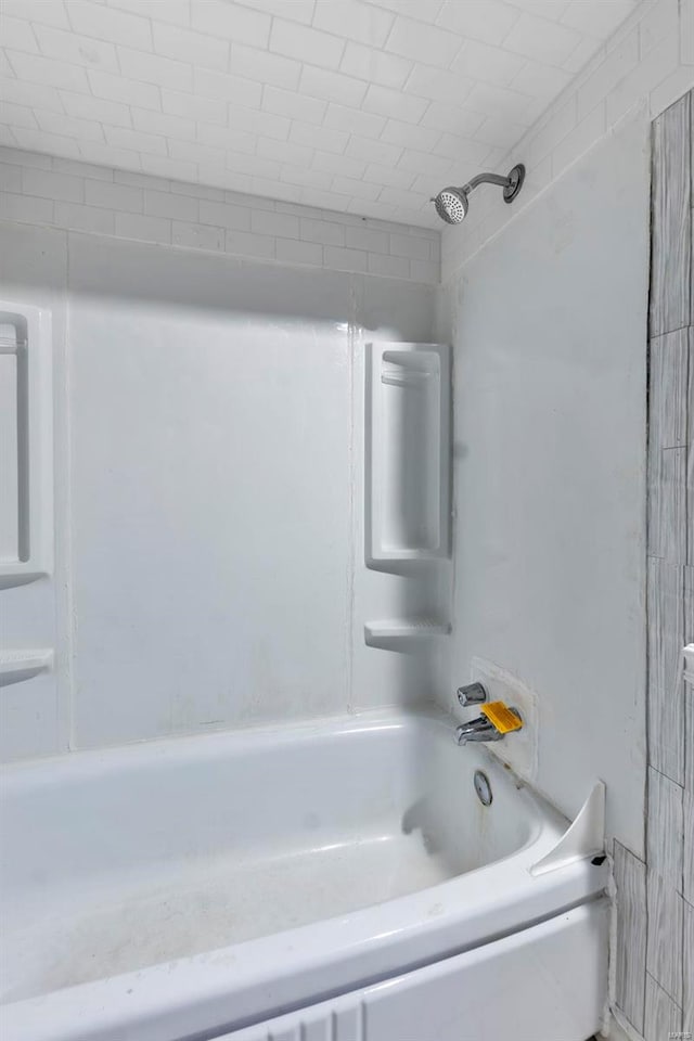 bathroom with shower / bathtub combination