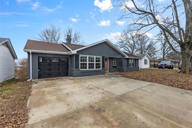 single story home featuring a garage