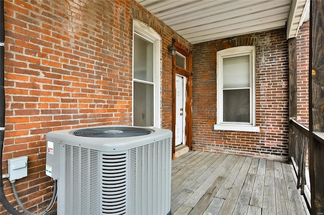 wooden terrace featuring central AC