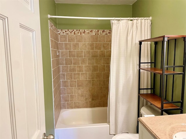 full bath with shower / bath combo, vanity, and toilet