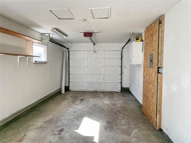 garage featuring a garage door opener