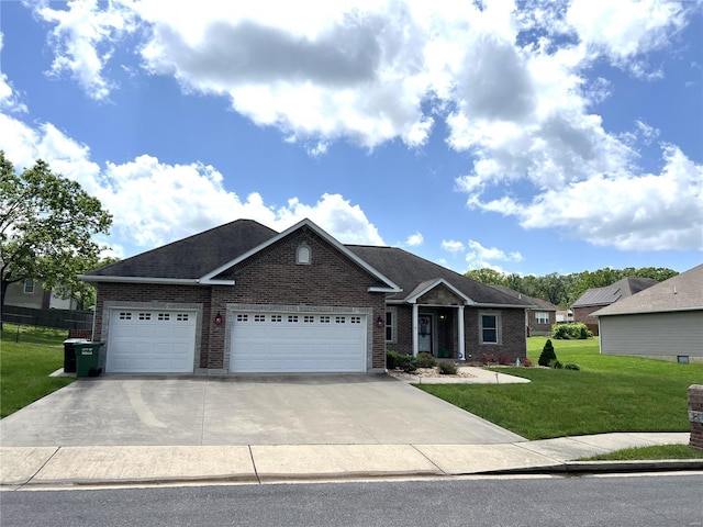 view of front of property featuring a garage and a front lawn