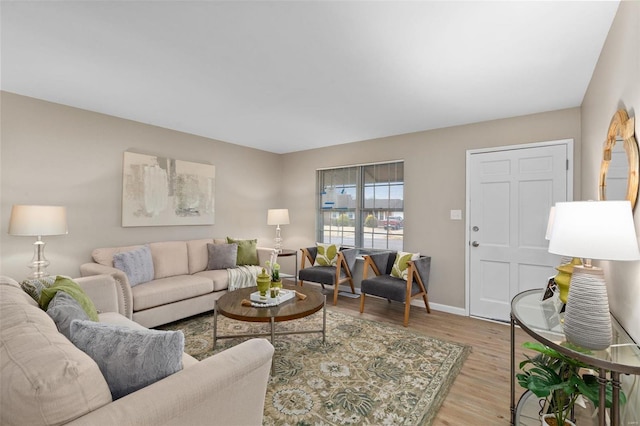 living room with light hardwood / wood-style flooring