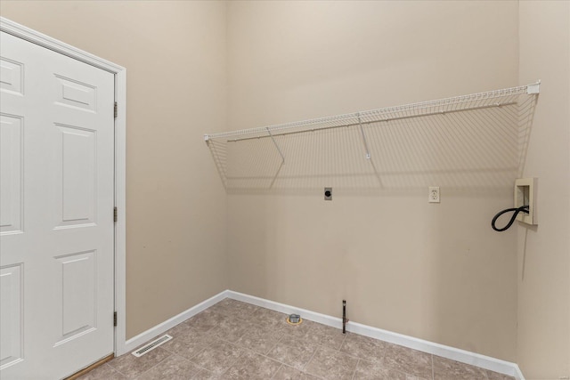 laundry room with hookup for a washing machine and hookup for an electric dryer