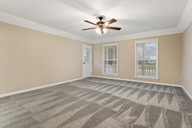 carpeted empty room with ceiling fan