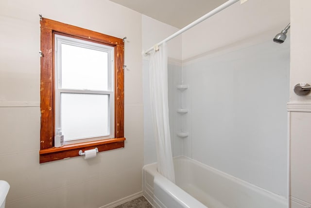 bathroom featuring shower / tub combo