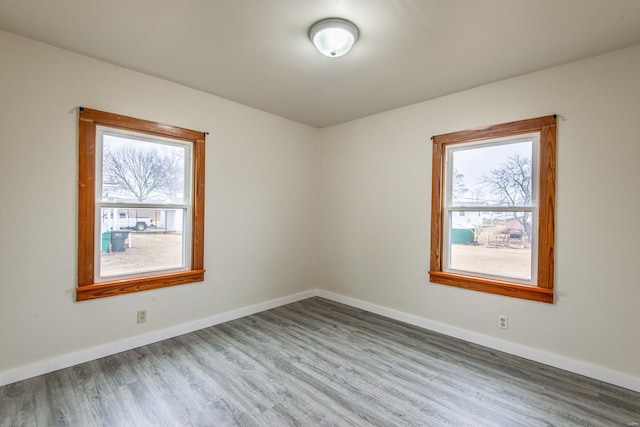 empty room featuring hardwood / wood-style flooring