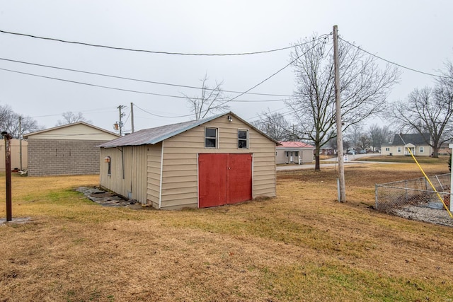 view of outdoor structure with a yard