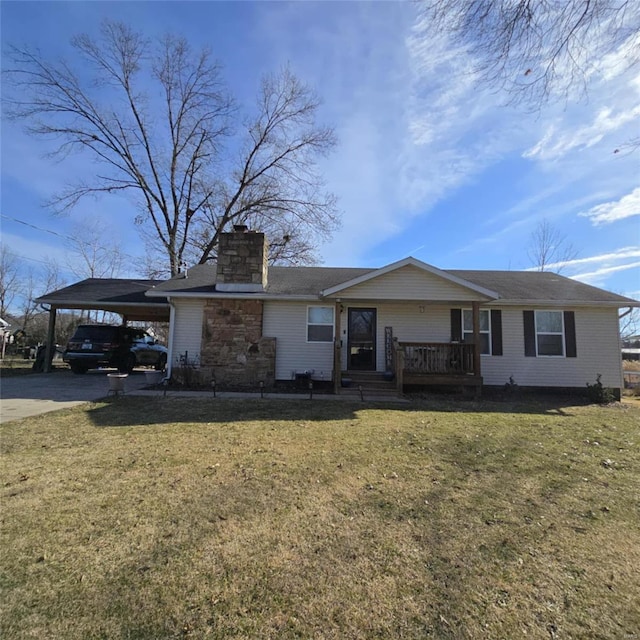 ranch-style house with a carport and a front yard