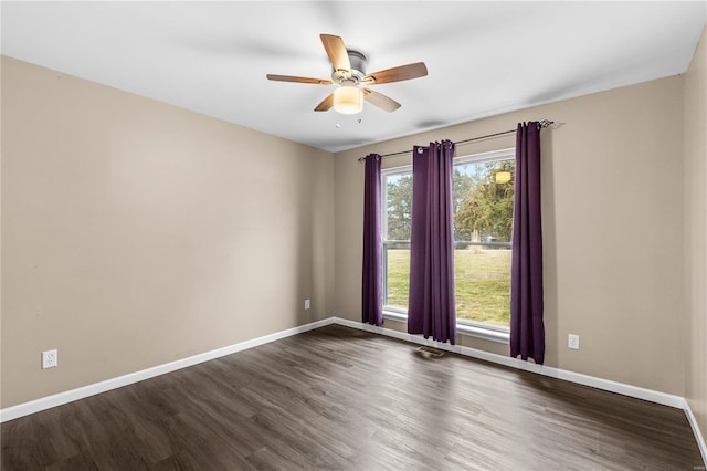 empty room featuring hardwood / wood-style flooring and ceiling fan