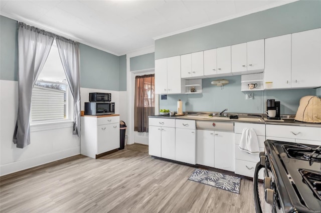 kitchen featuring white cabinetry, crown molding, and light wood-type flooring