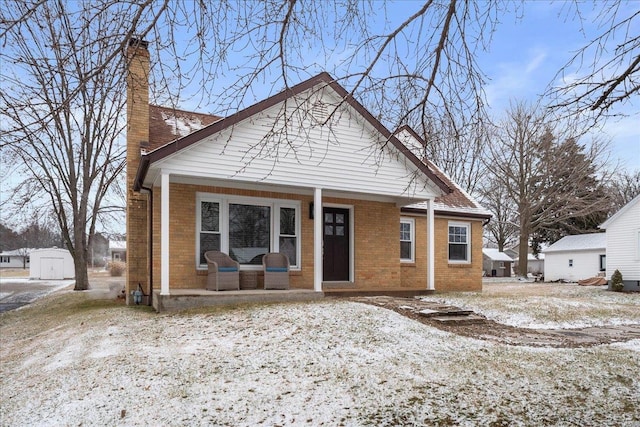 bungalow-style home featuring covered porch