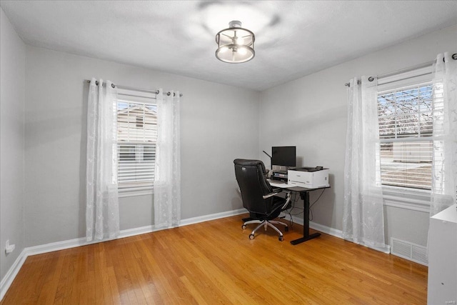 office space featuring hardwood / wood-style flooring