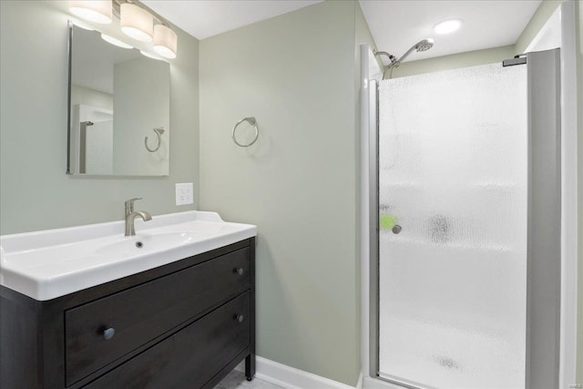 bathroom with vanity and walk in shower