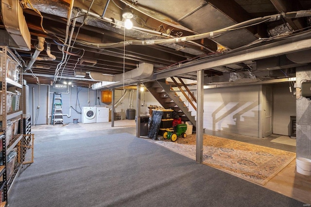 basement with washing machine and clothes dryer