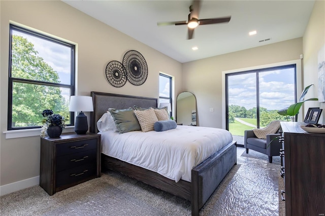 carpeted bedroom featuring access to exterior and ceiling fan