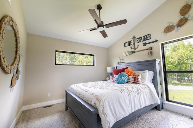 carpeted bedroom with lofted ceiling and ceiling fan