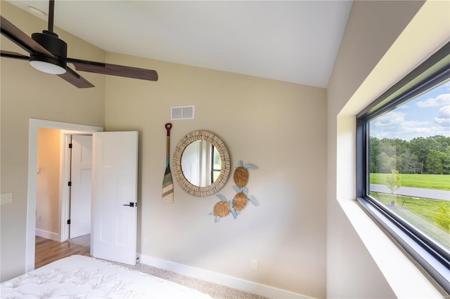 unfurnished bedroom with lofted ceiling