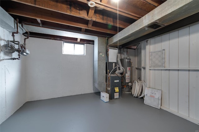 basement with heating unit and water heater