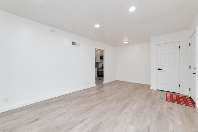 empty room featuring light hardwood / wood-style flooring