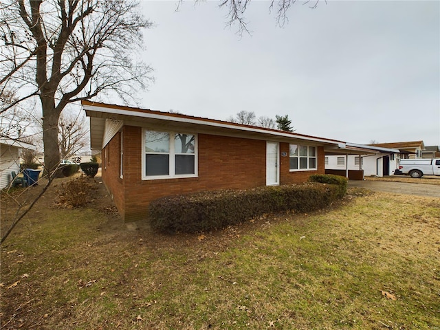 exterior space with a front lawn