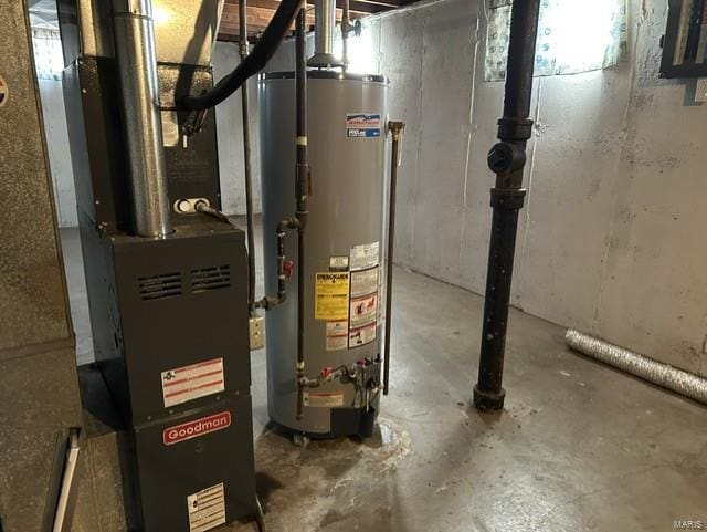 utilities featuring water heater and heating unit