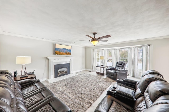 living room with crown molding and ceiling fan