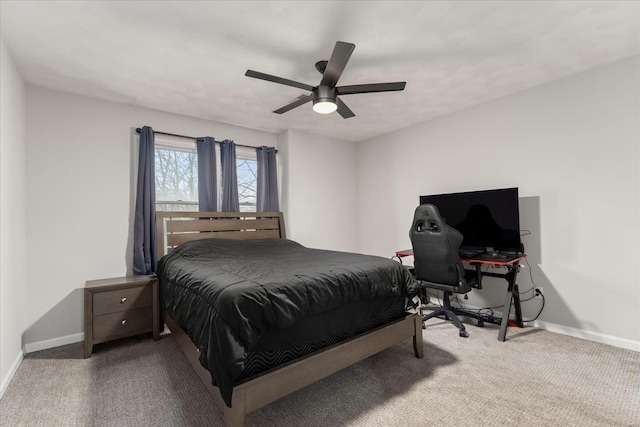 bedroom featuring light colored carpet and ceiling fan