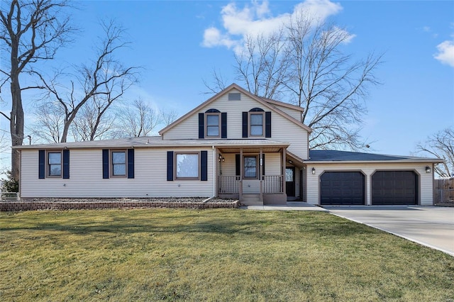 view of front facade with a garage, a front lawn, and a porch