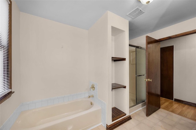 bathroom with plus walk in shower