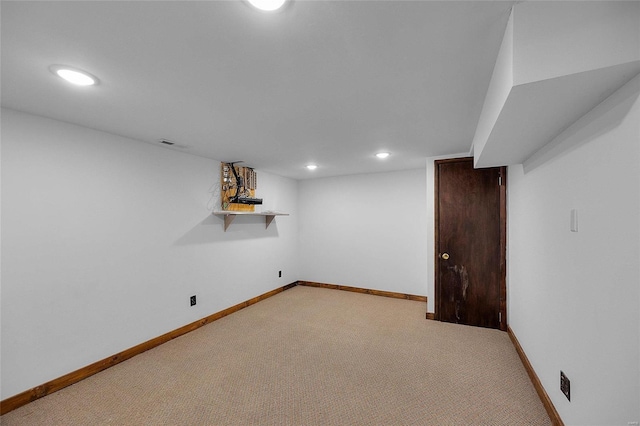 basement with light colored carpet