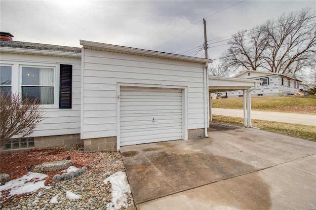 garage featuring driveway