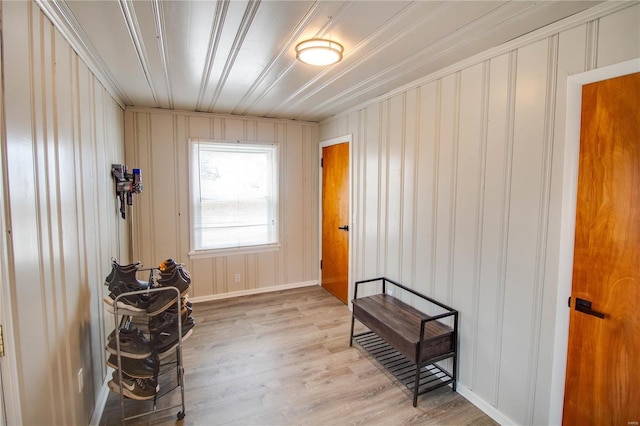 doorway with light wood-type flooring