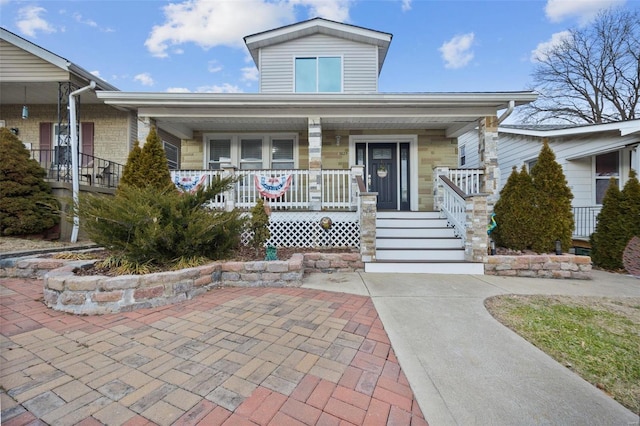 bungalow-style home with covered porch