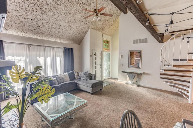 carpeted living room with ceiling fan, beam ceiling, and high vaulted ceiling